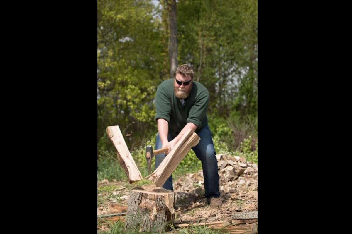 Man splitting wood