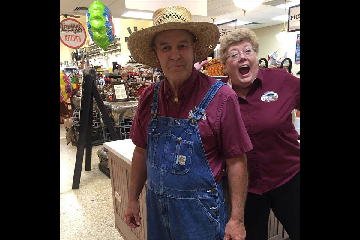 Roger, wearing is overalls for a day in the garden, gets photo-bombed by Tammy.